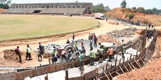 Men at work at Masinde Muliro Kanduyi Stadium