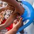 A woman is inoculated with a Covid-19 vaccine at Oltepesi Dispensary in Kajiado, Kenya