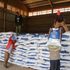 Workers arrange bags of subsidy fertilisers at the National Cereals and Produce Board depot in Elburgon, Nakuru County