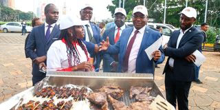 Agriculture Principal Secretary Mr Harry Kimtai, Nation Media Group Chief Executive Officer Stephen Gitagama