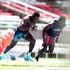 Africa 100m record holder Ferdinand Omanyala (left) trains with his younger brother Isaac Omurwa