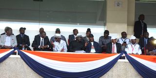 President William Ruto (left), opposition chief Raila Odinga (third left) and other dignitaries