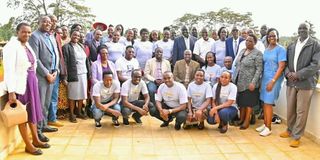 Governor Stephen Sang (seated at the centre in cream coat) with some of the25 students from Nandi who went to study in Finland
