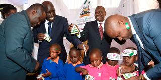 Basic Education PS Belio Kipsang and Uasin Gishu Governor Jonathan Bii and Cooperatives PS Patrick Kilemi