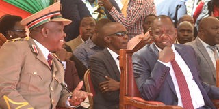 Uasin Gishu County Governor Jonathan Bii and County Commissioner Edison Nyale (left), during the Madaraka Day celebrations