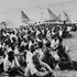 Hundreds of arrested Kenyans wait to be questioned after the massacre of 200 loyalist Kikuyus in a Mau Mau camp
