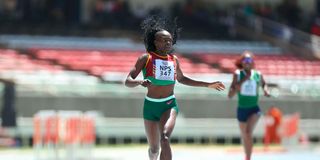 Mary Moraa crosses the finish line to win women's 400 metres race