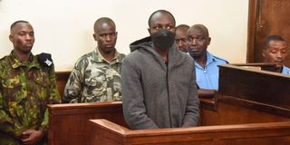 Jackton Odhiambo (centre), the main suspect in the killing of LGBTQ activist Edwin Kiprotich Kipruto alias Chiloba