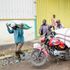 Farmers transport bags of subsidised fertiliser 