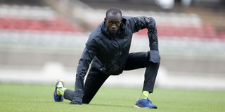 National 400 metres champion Zablon Ekwam stretches after a training session