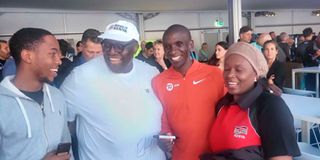 Kenya’s ambassador to Germany Thomas Amolo celebrates with Berlin marathon winner Eliud Kipchoge