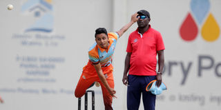 Vishil Patel of Ruaraka Sports Club 'A' team bowls against Sikh Union 'A'