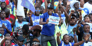 AFC Leopards fans cheer their team