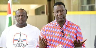 Energy CS Davies Chirchir with EPRA Director General Daniel Kiptoo