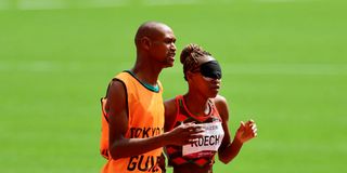 Kenya's Nancy Chelangat Koech and her brother-guide Geoffrey Kiplangat Koech