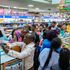 Parents and guardians shop for textbooks and other school items for their children at Savanis bookshop 
