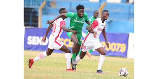 Gor Mahia midfielder Austin Odhiambo (centre) vies with Ulinzi Stars players Bernard Ongoma (left) and Alex Masinde