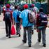 High school students walk home