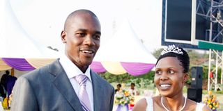 Kenya national cricket team spin bowler Collins Obuya with his wife Rachel Musyoka