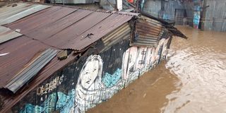 Flooded homes are seen at Mukuru-Kayaba slum