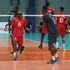 Kenya Prisons libero Peter Kibata (centre) leads his teammates in celebration