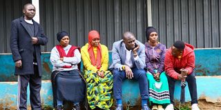 Nairobi Governor Johnson Sakaja sits with supporters and voters