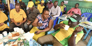 President William Ruto takes breakfast at a kibanda in Mandera Town.