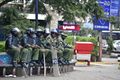 Anti-Riot police officers seated at the Hilton Square along Moi Avenue 