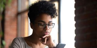 woman reading phone